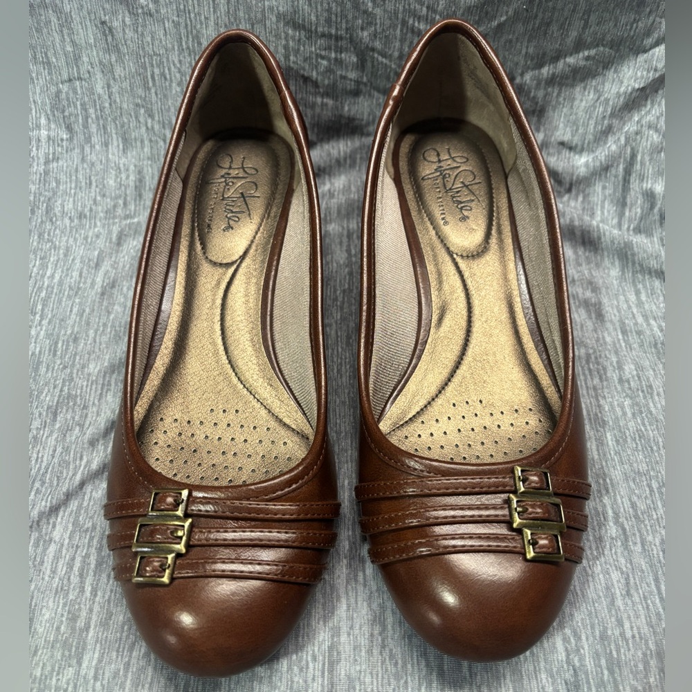 Brown leather flats
